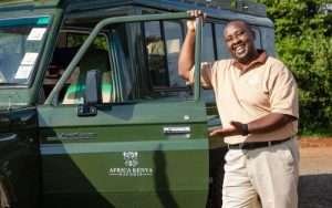 Guide by 4x4 safari jeep for a game viewing drive