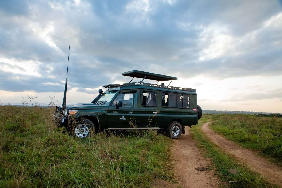 4x4 safari jeep at Nairobi National Park in Kenya Kenya safari tour packages by Aether safari collection scaled
